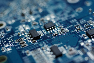 Circuit computer board chip. Computer hardware technology. Circuit computer board. Close up blue color.