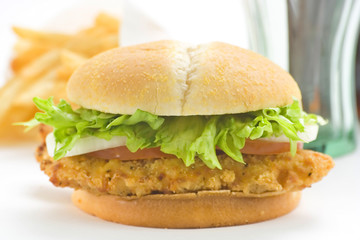 crisp chicken burger with tomato onion cheese lettuce