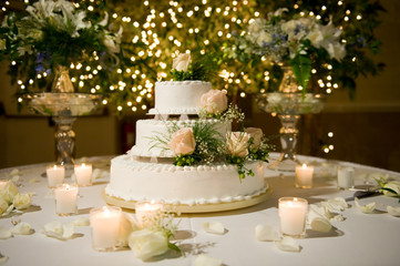 Wedding cake on the decorated table