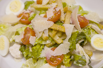 Greek salad with cherry tomato and Parmesan cheese
