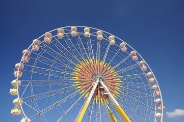 Fototapeta premium Big Ferris Wheel against blue sky