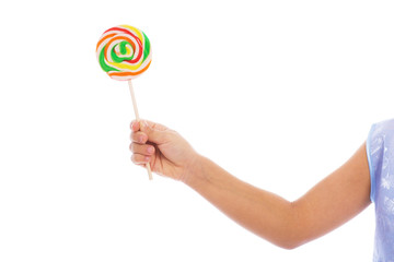 Color lollipop in child hand