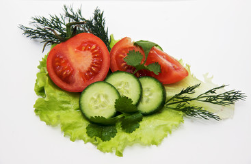 tomatoes and cucumbers on the salad