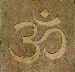 Om symbol engraved on stone
