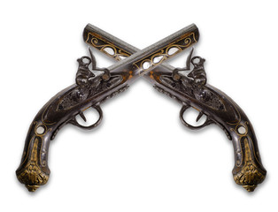 Old flintlock pistols isolated on white background