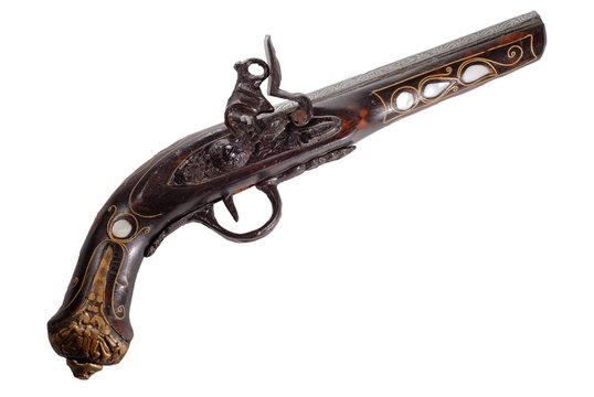 Old flintlock pistol isolated on white background