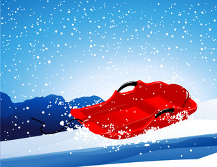 Red sledge on the slope