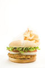 crisp chicken burger with tomato onion cheese lettuce
