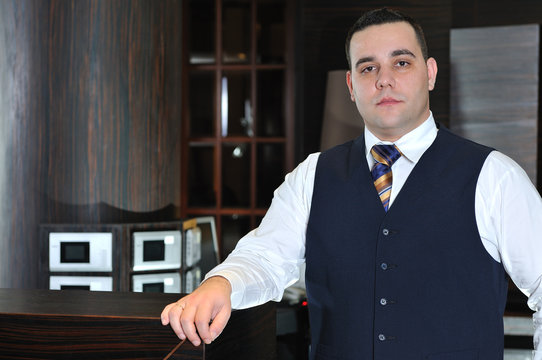 recetion man in hotel