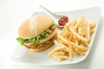 crisp chicken burger with tomato onion cheese lettuce
