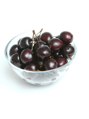 It is a lot of berries of a sweet cherry in a bowl
