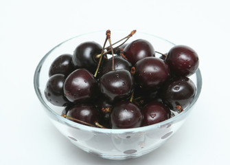 It is a lot of berries of a sweet cherry in a bowl