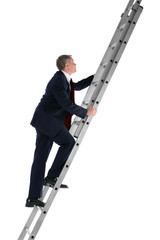 Businessman climbing ladder side view © RTimages