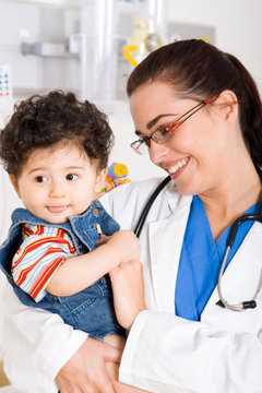 caring doctor and baby patient