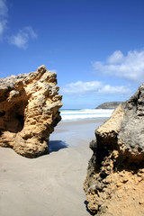 Fototapeta na wymiar Rocks, sand and sky in South Australia