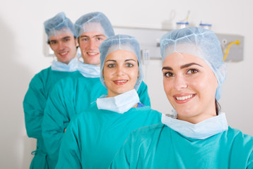 doctors in surgical gown