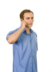 Young businessman talking on the phone. Isolated on whte.