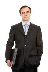 Young businessman with a laptop. Isolated on white.