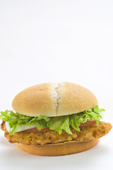 crisp chicken burger with tomato onion cheese lettuce
