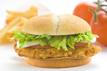 crisp chicken burger with tomato onion cheese lettuce
