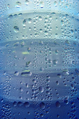 Dew drops on a fresh water bottle
