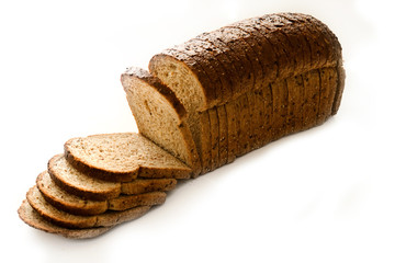 Slices of a whole bread isolated on white