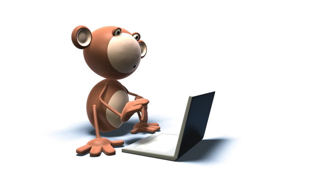 Singe devant un ordinateur