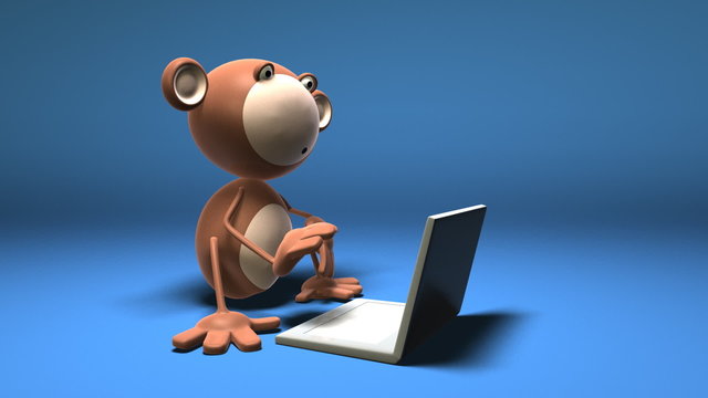 Singe devant un ordinateur