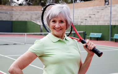Active Senior Playing Tennis