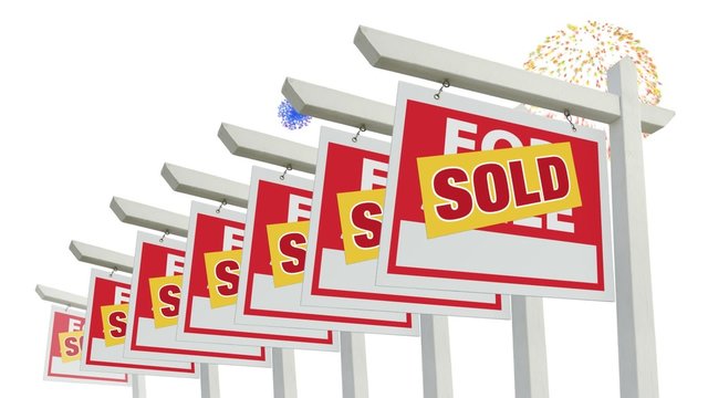 Row of Sold Real Estate Signs Lining Up & Fireworks in on White