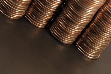 Background with close-up of four coin columns