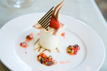a plate of ice cream dessert