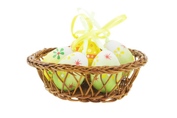 Fototapeta na wymiar Decorative Easter eggs in basket