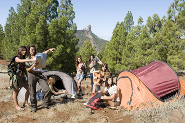 woman group in tent having camping at the mountain