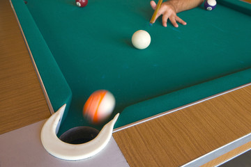 Playing billiards