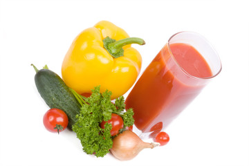 Tomatoes and juice on a white background