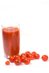 Tomatoes and juice on a white background
