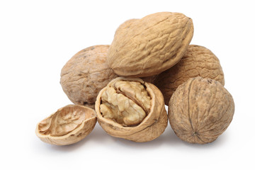 Lot of walnuts isolated on white background