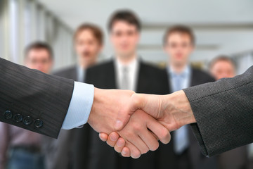 shaking hands and business team