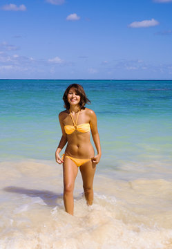 beautiful Polynesian girl in  bikini on a Hawaii beach