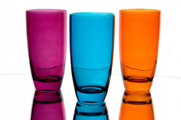 Colored Glasses Illuminated and Reflecting Light