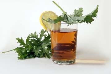 hot tea with lemon and geranium leaf
