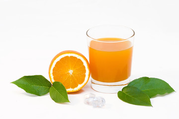 Orange and juice with pieces of ice