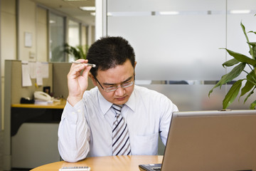 asian business executive at work