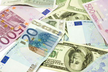 Obraz na płótnie Canvas Dollar and euro banknotes