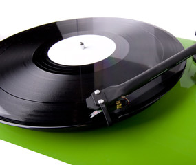 Green Turntable Playing A Record on White