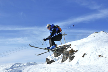 Fototapeta na wymiar Airoski: skier performing a long jump