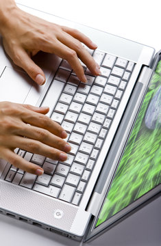 Female Hands Typing on Laptop Keyboard on White