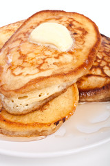 Pancakes with maple syrup and melted butter