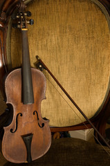 Antique Violin, Bow, And Chair